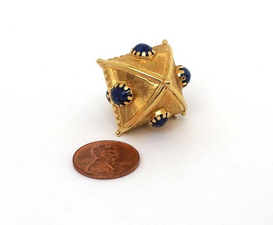   is a beautiful vintage 18k gold and lapis geometric charm pendant the